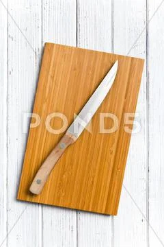 Cutting board with knife Stock-Fotos