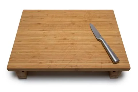 Cutting board with knife Stock Photos