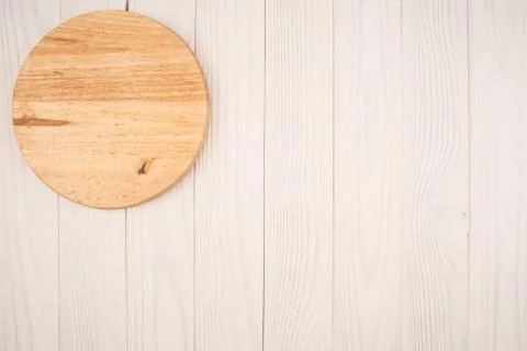 Cutting board on old table Stock Photos