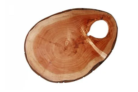 Cutting board sawn from a pine trunk isolated on white background 스톡 사진