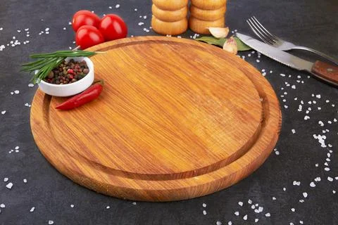 Cutting board on surface Stock Photos