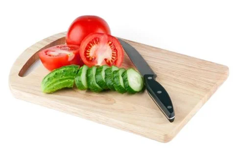Cutting board with vegetables Stock Photos