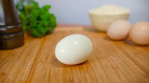 Cutting Boiled Egg On A Cutting Board Video stock 64255493