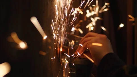 Cutting a bolt off a wall with a grinder Stock Footage 116743921