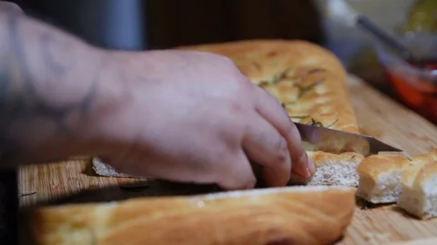Cutting Bread 1 Stock Footage 126310496