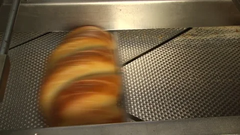 Cutting bread. Automation Stock Footage 71976481