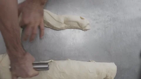 Cutting bread dough into small pieces and rolls_sourdough 스톡 동영상 251364035