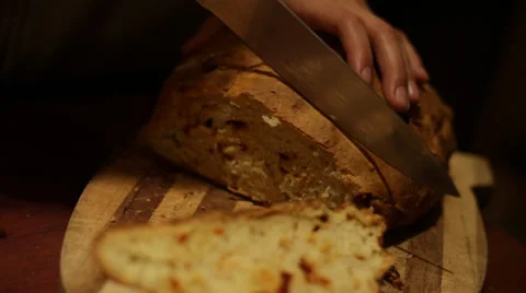Cutting bread Stock Footage 33194793
