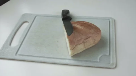 Cutting bread Stock Footage 53850639