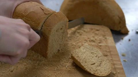Cutting Bread Stock Footage 55874350