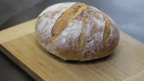 Cutting bread Stock Footage 121120866