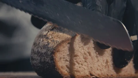 Cutting Bread Stock Footage 124305984