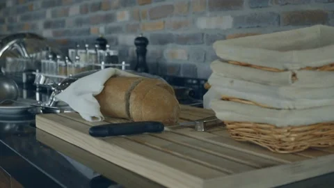 Cutting a bread. Stock Footage 133773248