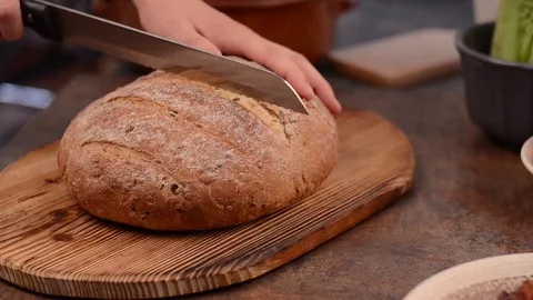 Cutting bread footage video Stock Footage 76890431