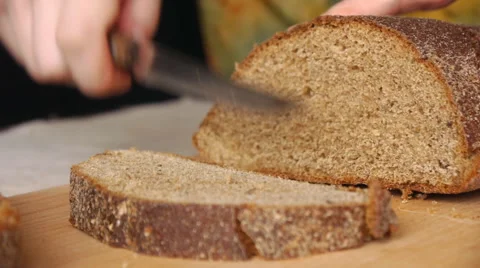 Cutting Bread With The Knife Stock Footage 66101313