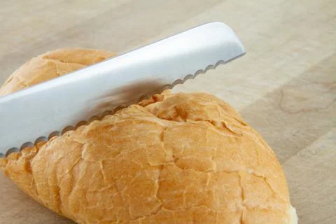 Cutting bread Stock Photos