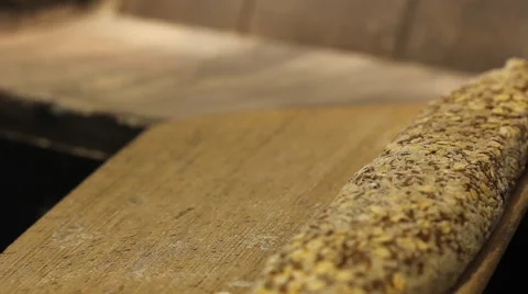 Cutting bread with razor blade  Stock Footage 54522478