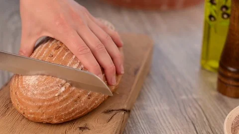 Cutting bread stock footage Stock Footage 75469004