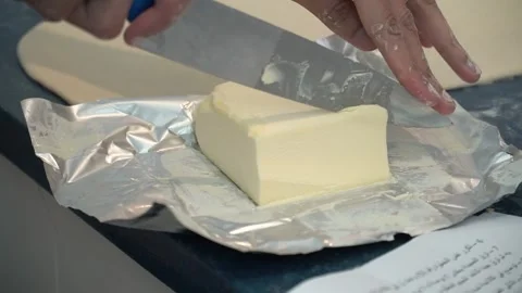 Cutting Butter Stock Footage 317472576