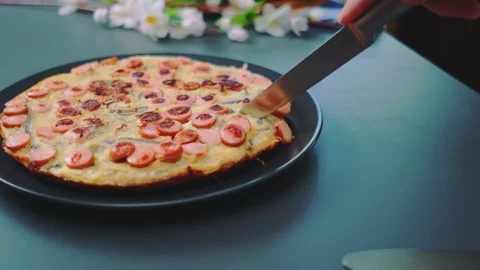 Cutting cabbage casserole with a knife Stock Footage 249786287