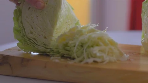 Cutting cabbage with a cleaver knife Stock Footage 109552437