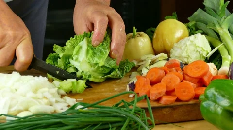 Cutting cabbage on desk in the kitchen Stock Footage 68062037