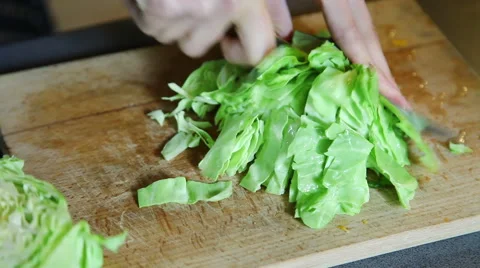 Cutting cabbage Stock Footage 40978576