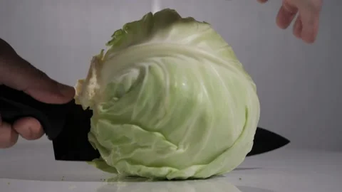 Cutting Cabbage In Half, Slow Motion Stock Footage 220755510