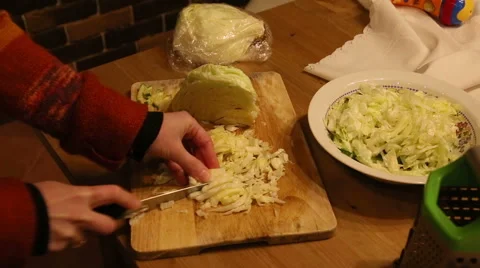 Cutting cabbage with a knife Stock Footage 60657522
