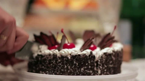 Cutting cake with cherries Stock Footage 58726088