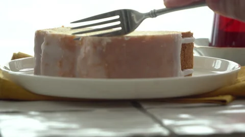 Cutting cake with a fork to eat, close up Stock Footage 205216317