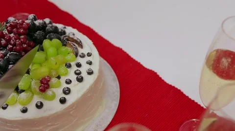 Cutting the cake with fruit Stock Footage 56568381