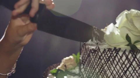 Cutting cake with knife Stock-Footage 69874388