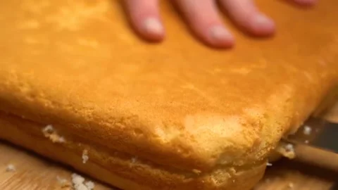 Cutting cake layers, tall layers, delicious cake layers, cake assembly Stock Footage 155815370