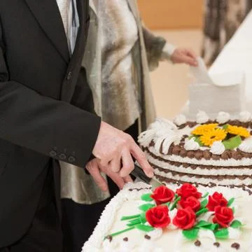 Cutting the cake Stock Photos
