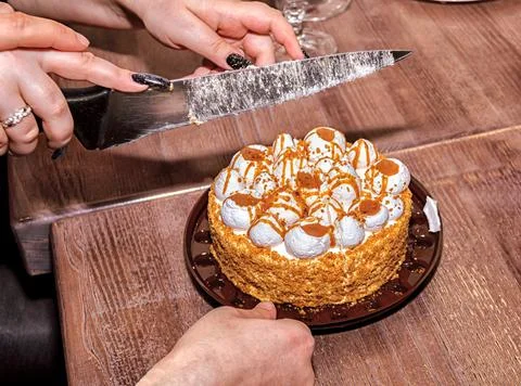 Cutting the cake Stock Photos