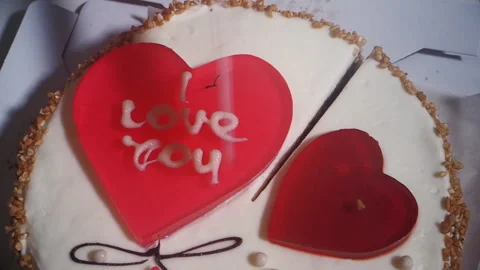 Cutting the cake on the table Stock Footage 105141564