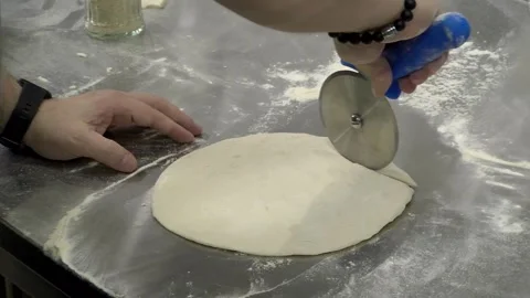 Cutting Calzone Pizza Dough Stock Footage 131985500