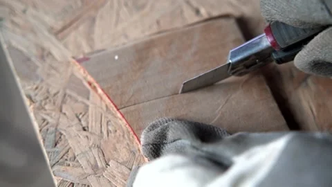 Cutting cardboard with trimming knife Stock Footage 161165331