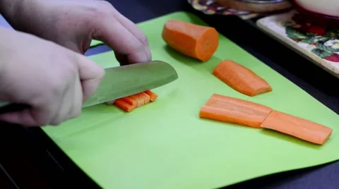 Cutting carrot cubes Stock Footage 68318919