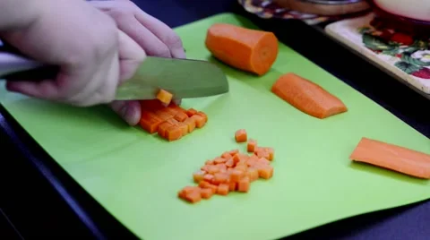 Cutting carrot cubes Stock Footage 68318952