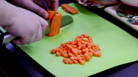 Cutting carrot cubes Stock Footage 68318973