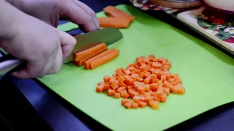 Cutting carrot cubes Stock Footage 68318996
