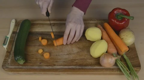 Cutting carrot Stock Footage 22099093