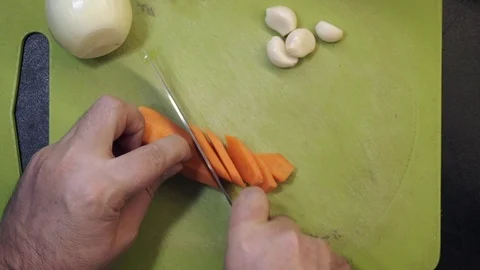 Cutting carrot Stock Footage 97410540