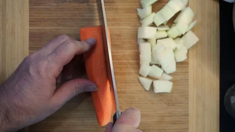 Cutting carrot overhead Stock Footage 120462262