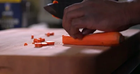 Cutting a carrot in slow motion 1 Stock Footage 87846437