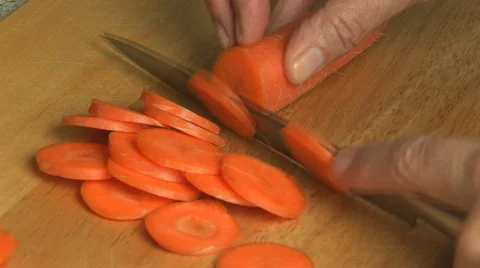 Cutting carrots close Stock Footage 91716
