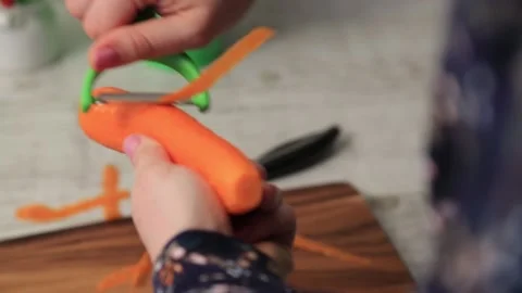 CUTTING CARROTS Stock Footage 155411693