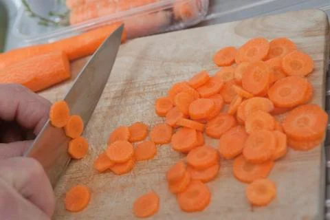 Cutting carrots Stock Photos
